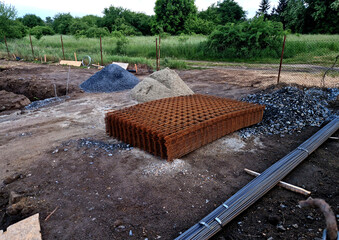 basement of a family house for boiler room and garage. concrete foundations and retaining walls are...