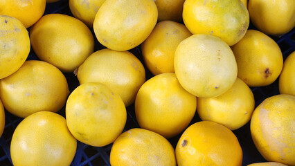 Fruits and vegetables in baskets and crates in the grocery section