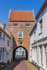 Street leading to the historic Gevangenpoort gate in Woudrichem, Netherlands