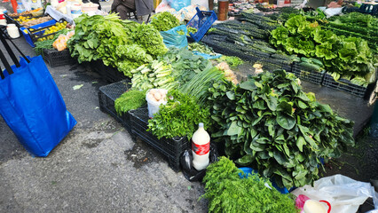 Fruits and vegetables in baskets and crates in the grocery section