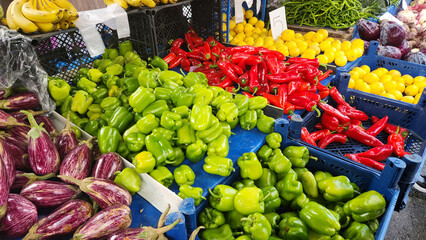 Fruits and vegetables in baskets and crates in the grocery section