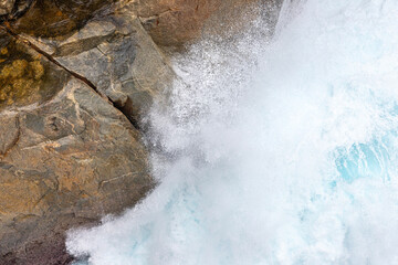 The Southern Ocean breaking on the entrance to The Gap in the Torndirrup National Park near Albany in the Shire of Denmark, Great Southern region of Western Australia, WA, Australia.