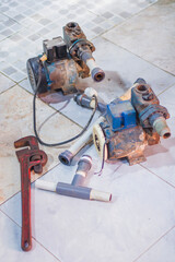 plumber fixing water pipe