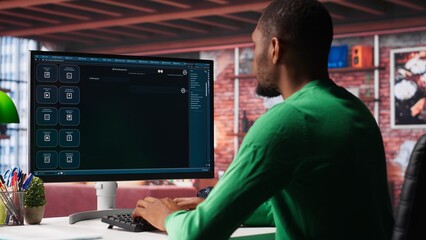 Black male freelancer at home uses AI chatbot for task completion, automation and machine learning....