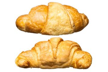Closeup view of two freshly baked croissants isolated over a white background
