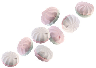 Perfectly retouched double colored marshmallow flies in space forming an unusual shape. Isolated on...