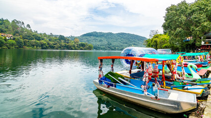 Naukuchiatal is a serene lake town in the Nainital region of Uttarakhand, India famous for water boating.
