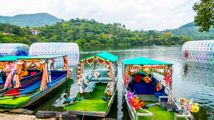 Naukuchiatal is a serene lake town in the Nainital region of Uttarakhand, India famous for water boating.