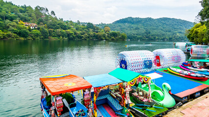 Naukuchiatal is a serene lake town in the Nainital region of Uttarakhand, India famous for water boating.