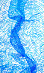 Stretched out blue netting background