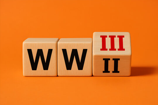 Wooden blocks spell out WWII, with a rotating block ominously displaying the potential for WWIII.