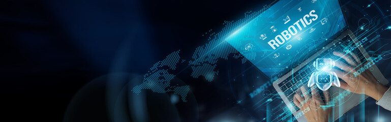 Businessmen use laptops and robotics to automate tasks, improve efficiency, analyze data, enhance...