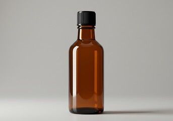 Empty brown glass bottle with black cap isolated on white background