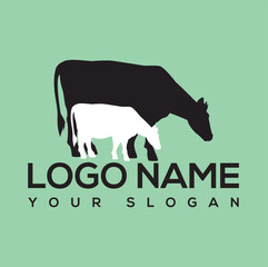 Cow and calf in the grass field,