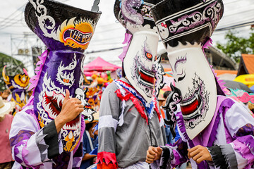 Phi Ta Khon is the name of performance in which performers wear scary and ugly but colorful masks,...