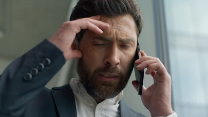 Close up unhappy frustrated Caucasian middle-aged business man talking mobile phone call failure upset in office worry stressed 40s businessman male talk smartphone problem discuss suffering headache - Powered by Adobe