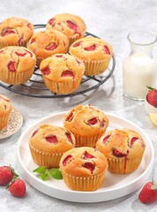 Strawberry muffins are a type of cake made from a mixture of flour, sugar, eggs, milk and leavening agents such as baking powder, with the addition of fresh strawberry pieces.