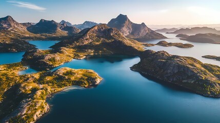 Fototapeta premium Serene Aerial Landscape of Majestic Mountains and Tranquil Waters