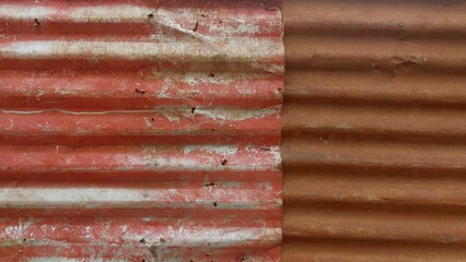 Rusty corrugated iron sheet metal creating a textured background for construction fence