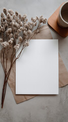 Blank piece of paper mockup with dried flowers and coffee mug