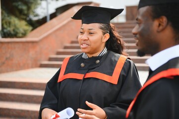 Happy African American students on their graduation day