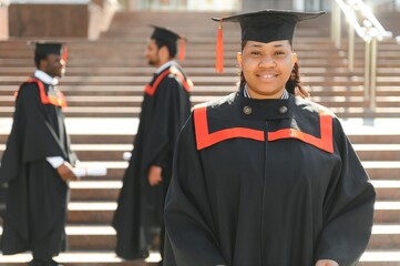 pretty african female college graduate at graduation