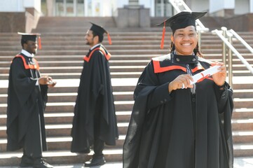 Excited African American woman at her graduation