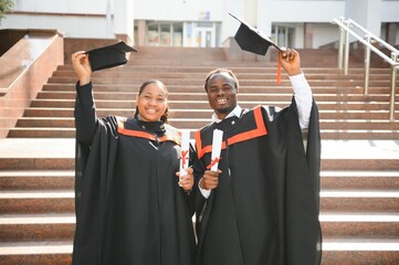 Happy African American students on their graduation day