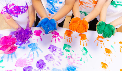 Colorful Handprints Celebrate Creativity During a Joyful Art Activity at a Community Center Filled...