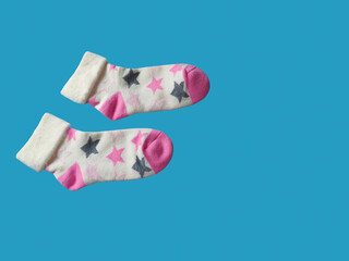 Bright children's multi-colored socks with decorative pattern, top view