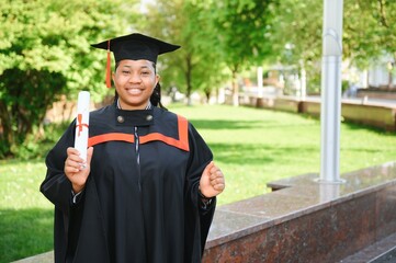 Excited African American woman at her graduation