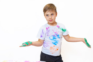 Young Artist Joyfully Expressing Creativity With Colorful Paints While Showcasing Hands Covered in Vibrant Hues in a Bright Studio