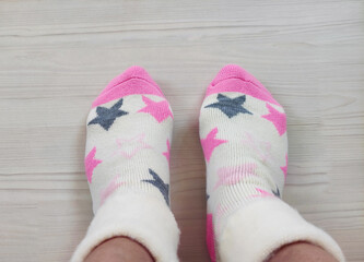 Bright children's multi-colored socks with decorative pattern, top view