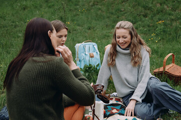Older women enjoying an active healthy lifestyle outdoors, sharing wellness moments together in a...