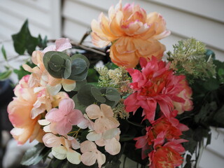 A bouquet of flowers with different colors and textures.
