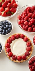 Fresh Berries and Tart with Cream on White Background for Dessert