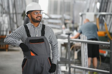PVC industry worker or operator making frames for windows and doors