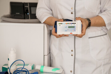 Polysomnography Setup: Medical Professionals Utilizing a Portable Sleep Study Device with Digital...