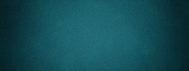 Dark teal suede fabric background with matte velvet texture, emerald tones and soft felt surface in...