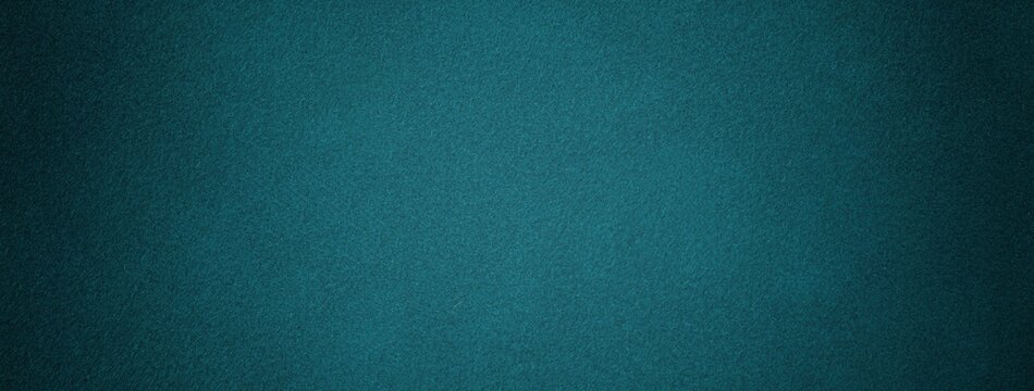 Dark teal suede fabric background with matte velvet texture, emerald tones and soft felt surface in macro.