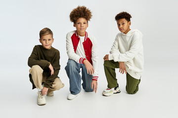 Stylish little boys showcasing vibrant friendship through unique fashion expressions