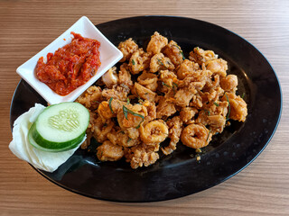Crispy Fried Calamari and Prawns with Spicy Sambal and Fresh Cucumber