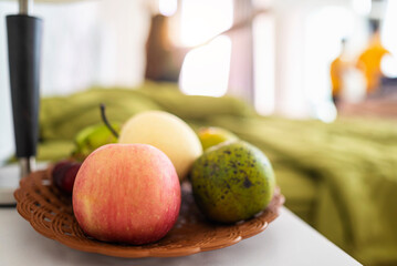 Closeup view of a variety of fruit on the desk. Healthy eating concept