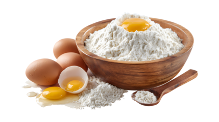 Bowl of flour and eggs isolated on a white background