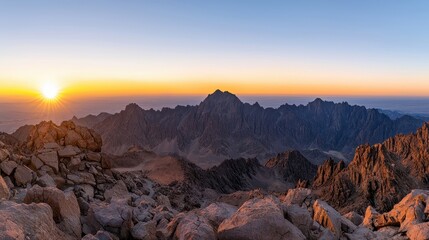 Majestic Sunrise Over Rugged Mountain Landscape with Stunning Rock Formations and Vibrant Colors