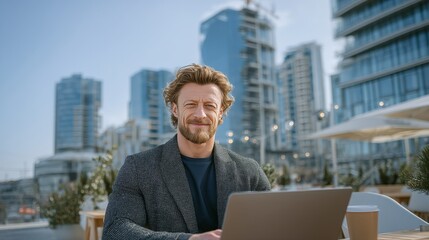 Working in business casual attire with a laptop at a trendy rooftop bar in the city
