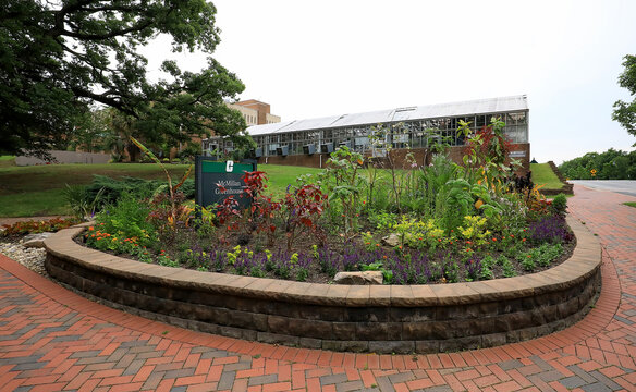 McMillan Greenhouse at the University of North Carolina, with eight greenhouse, terraces, surrounding beds, and a courtyard, started in 1966, located in Charlotte, North Carolina, USA. 