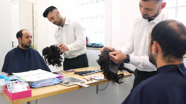 Professional hair clinic technician guiding client through non surgical hair replacement system, demonstrating detailed restoration technique in slow motion healthcare setting