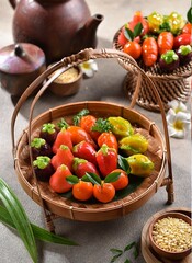 Luk chup, also spelled look choop, is a type of Thai dessert derived from marzipan, a recipe from Portugal, called massapão