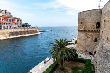 Coastal fortress and red building near the sea